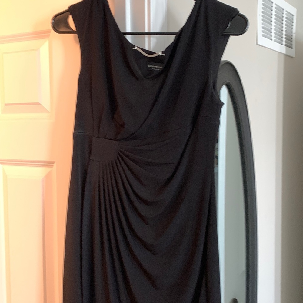 Black dress knee length! Very pretty with silver front accent.